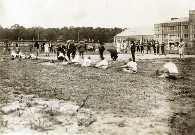 Horizontal Photograph of Two Teams Competing at Tug of War by Jessie Tarbox Beals